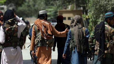 Taliban fighters patrol in the Wazir Akbar Khan neighborhood in the city of Kabul, Afghanistan
