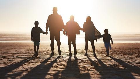 Parents and children on beach