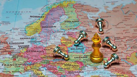 Chess pieces over a map