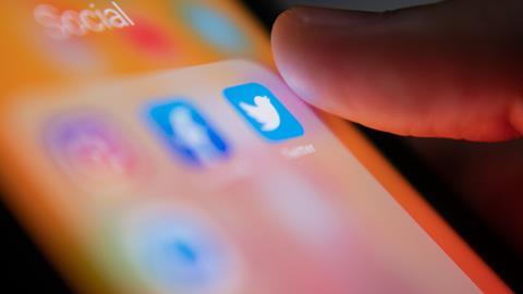 The Twitter app icon displayed on a phone