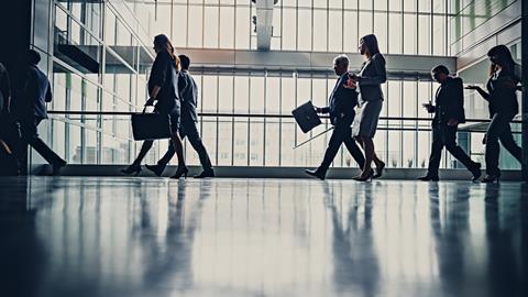 Office workers leave the office