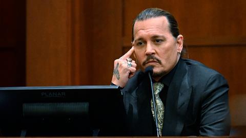 Actor Johnny Depp testifies during a hearing at the Fairfax County Circuit Court
