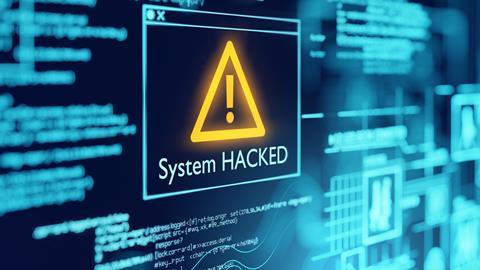 System hacked warning on computer screen
