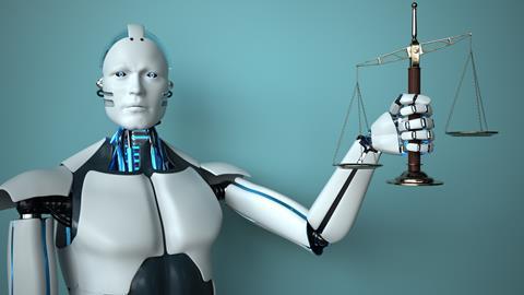 Robot holds justice scales