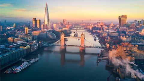 A view of London from above the Thames, looking down on Tower Bridge