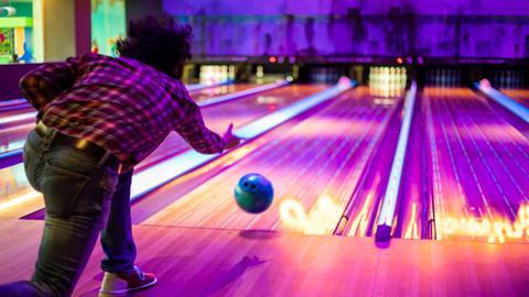 A man at a bowling alley