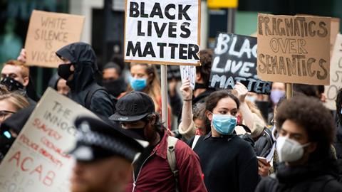 Black Lives Matter protestors march down Victoria st in central London