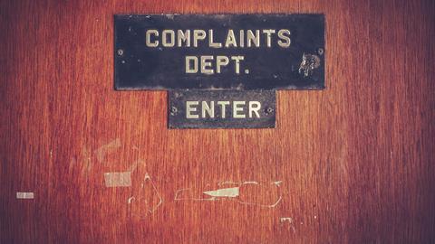 Complaints department sign