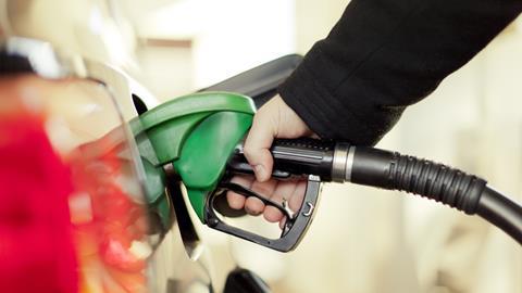 Pumping petrol into a car