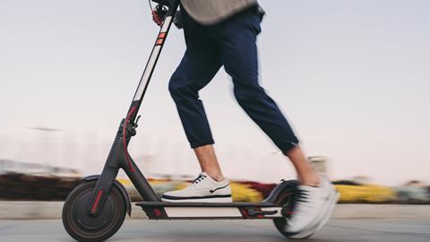 Man riding electric scooter