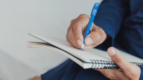 Journalist taking notes