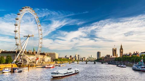 Shot of the Thames River, London, showing the London Eye and the Houses of Parliament