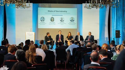Burford Capital’s Christopher Bogart (second from the left) spoke with other funders at a panel session