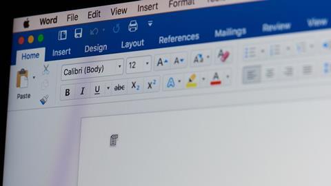 A close up of a blank Microsoft Word document