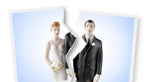 Ripped photograph of wedding cake topper