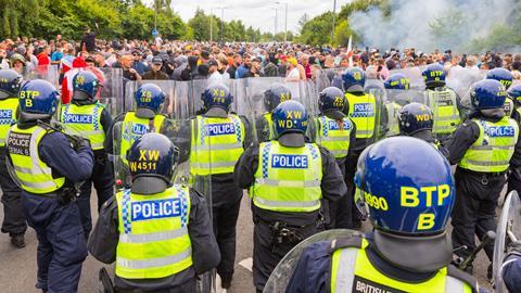 Rioters continue to clash with police as hundreds of police and protestors clash outside a Holiday Inn Express, Rotherham