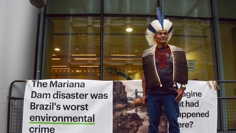 Members of the village communities affected by the Mariana Dam disaster, the largest ever environmental disaster in Brazil, stage a protest outside the Rolls Building as the trial against mining company BHP begins at the High Court