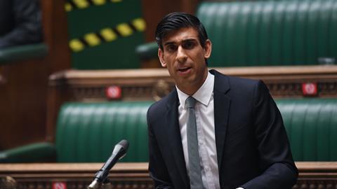 Rishi Sunak reads out his budget statement in the House of Commons
