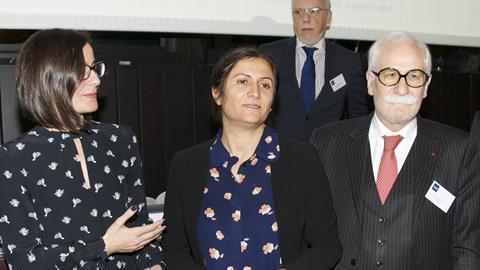 Turkan Elci (centre) and Ayse Bingol Demir receive the CCBE's 2016 award for human rights from CCBE president Michel Benichou (right)