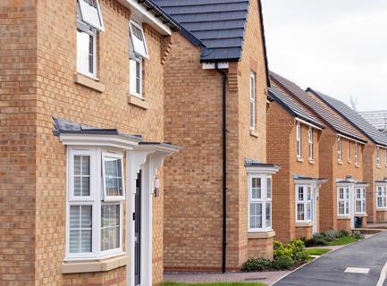 A row of new build detached houses