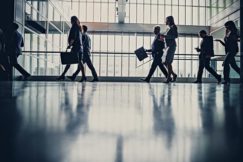 Office workers leave the office
