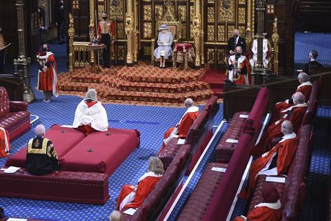 Queen Elizabeth II delivers a speech from the throne in the House of Lords during the State Opening of Parliament in the House of Lords at the Palace of Westminster in London