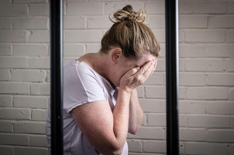 Woman bars prison