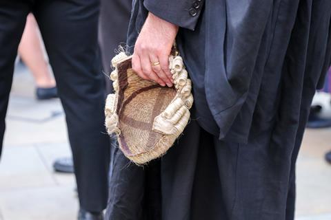 Barrister holds wig