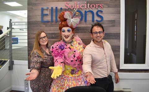 Antony Stuart-Hicks (Dame Maris Piper) poses with Ellisons Solicitors staff in Colchester, Photo by Nathan Garwood