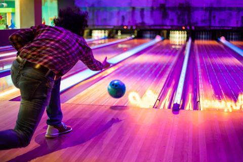 A man at a bowling alley