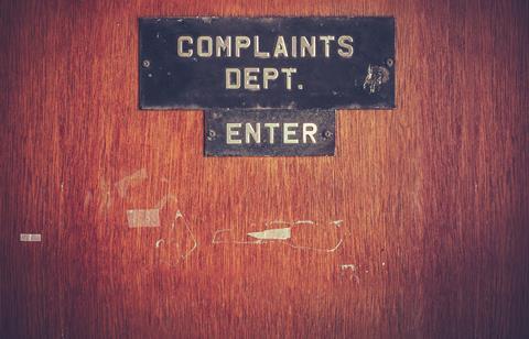 Complaints department sign