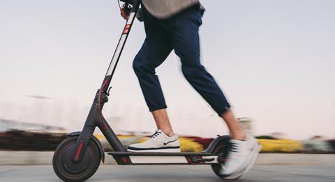 Man riding electric scooter