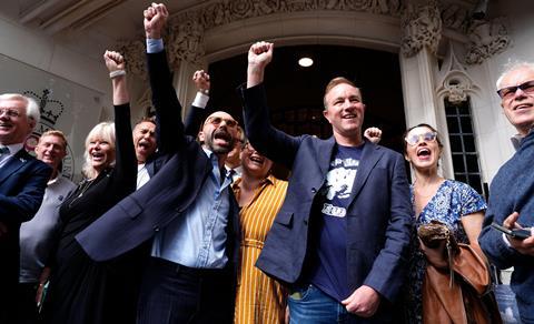 Former traders Carlo Palombo (centre left) and Tom Hayes (centre right) outside the UK Supreme Court in central London, after they had their convictions quashed