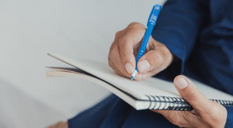 Journalist taking notes