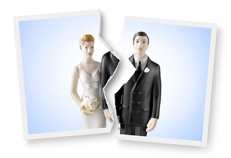 Ripped photograph of wedding cake topper