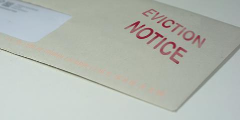 Eviction notice with warning printed on envelope