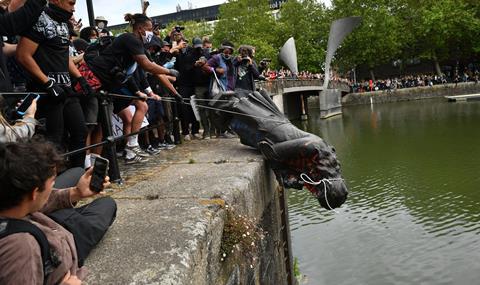 Protesters throw statue of Edward Colston into Bristol harbour