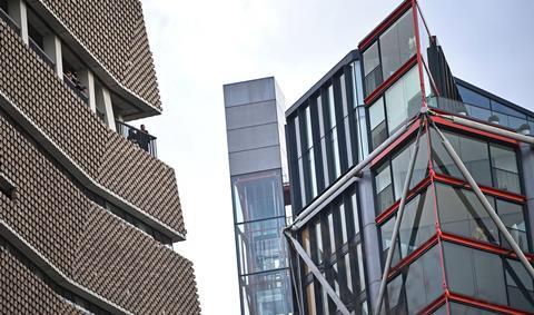 Flats in the Neo Bankside development on the London's South Bank (right) are overlooked by the Tate's viewing gallery (left)