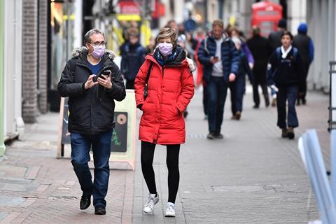 Shoppers on Oxford Street, wearing medical masks