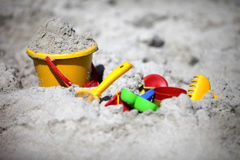 Bucket and spades in sand