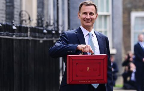Chancellor of the Exchequer Jeremy Hunt presents the Spring Budget in Downing Street