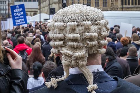 Barristers and solicitors protest in a second mass walkout over cuts to legal aid, Westminster