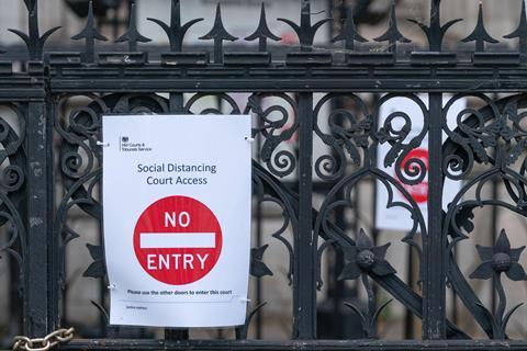 Social distancing sign outside court during Covid-19 pandemic