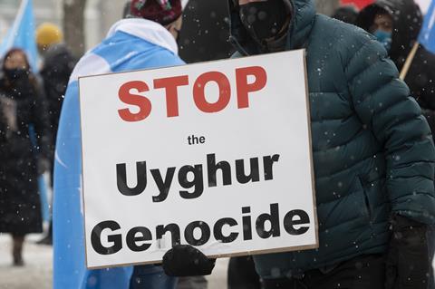 Protesters gather outside the Parliament buildings in Ottawa, February 2021