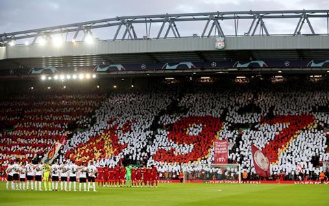 Liverpool fans hold up signs in reference to the 97 victims of the Hillsborough disaster inside the stadium before the Liverpool v Benfica match, April 13, 2022