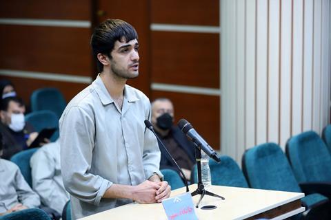 Mohammad Mehdi Karami speaks during his trial