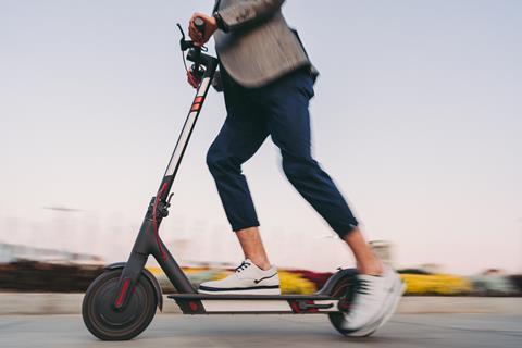 Man riding electric scooter