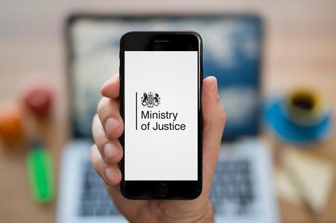 The Ministry of Justice logo is displayed on a smartphone