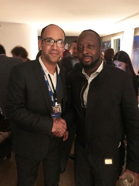 Solomon Ebere and the Fugees’ Wyclef Jean
