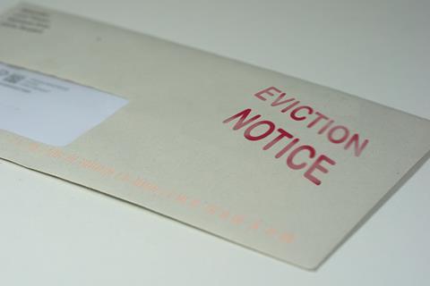 Eviction notice with warning printed on envelope